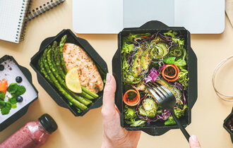 Female,Hands,Hold,Food,Delivery,Box,Having,Lunch,At,Work