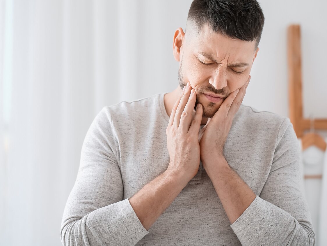 Man,Suffering,From,Tooth,Ache,In,Morning